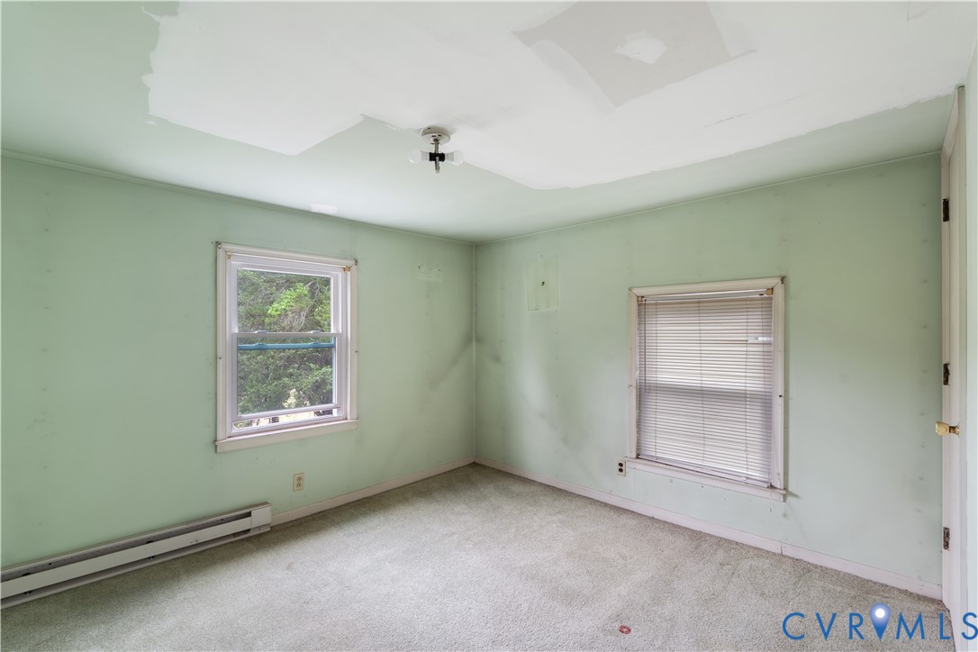 1497 Sutlers Road Charlottesville, VA 22902 - Photo 11 of 20 an empty room with a window