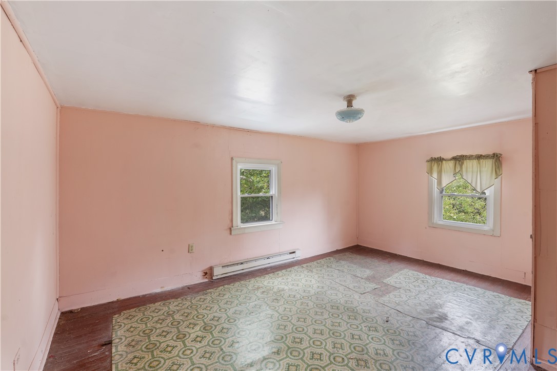 1497 Sutlers Road Charlottesville, VA 22902 - Photo 14 of 20 an empty room with windows