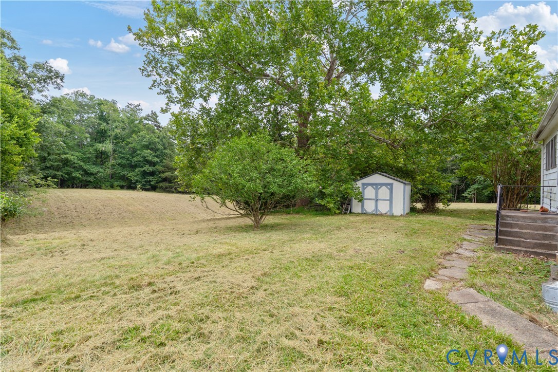 1497 Sutlers Road Charlottesville, VA 22902 - Photo 17 of 20 a view of a big yard with large trees