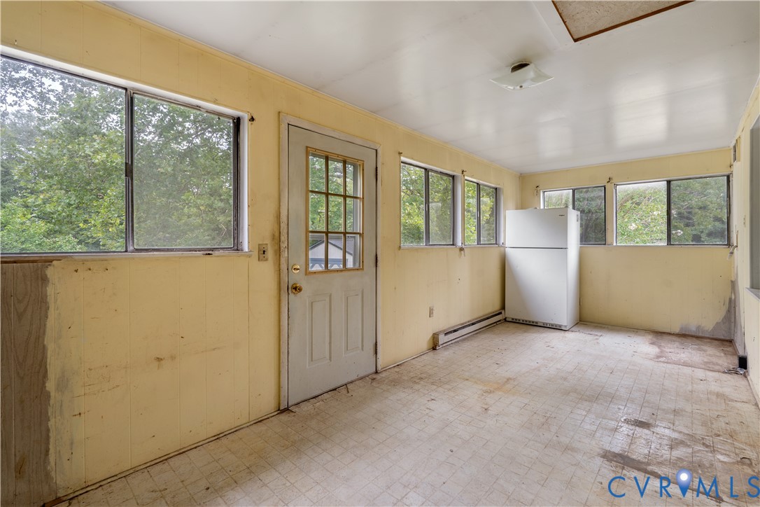 1497 Sutlers Road Charlottesville, VA 22902 - Photo 9 of 20 an empty room with windows