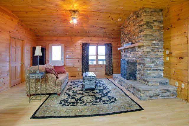 6009 Spring Hill Road Bridgewater, VA 22812 - Photo 5 of 25 a living room with couch and a fireplace