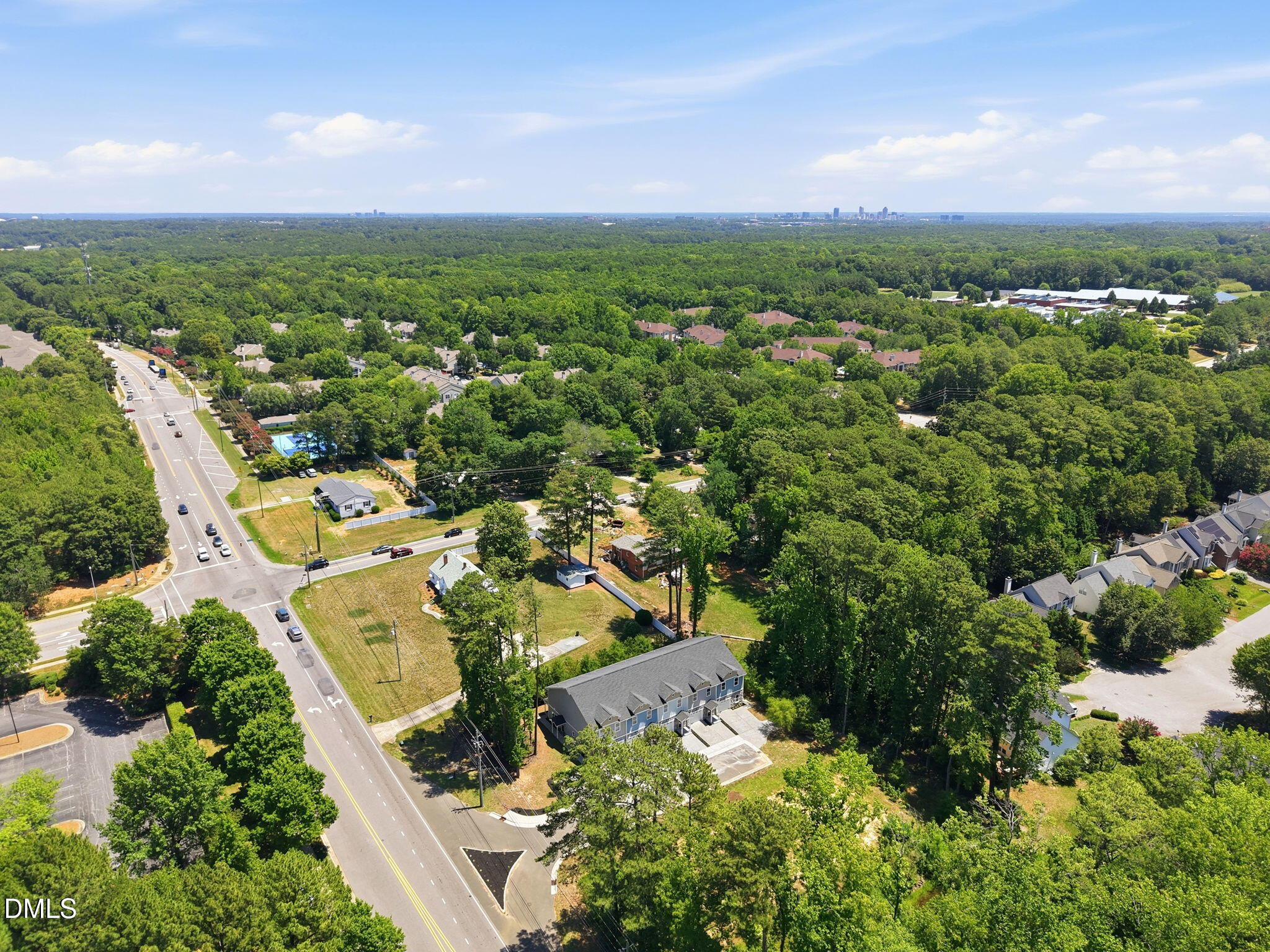 5508 Batoul Lane Raleigh, NC 27606 - Photo 2 of 59 14-web-or-mls-DJI_20260630123107_0111_D_