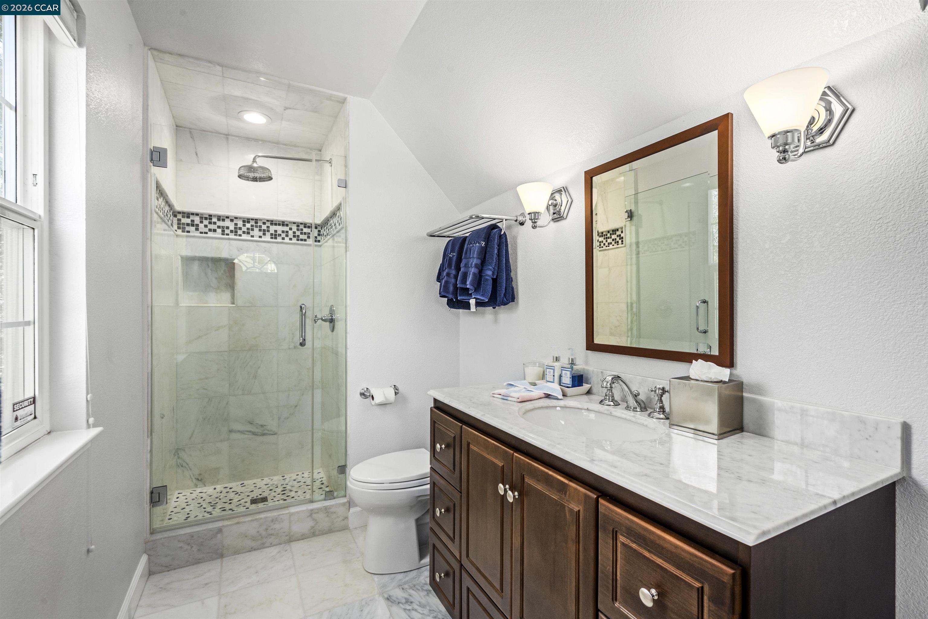 177 Oak Road Alamo, CA 94507 - Photo 17 of 85 a bathroom with a sink a toilet and shower