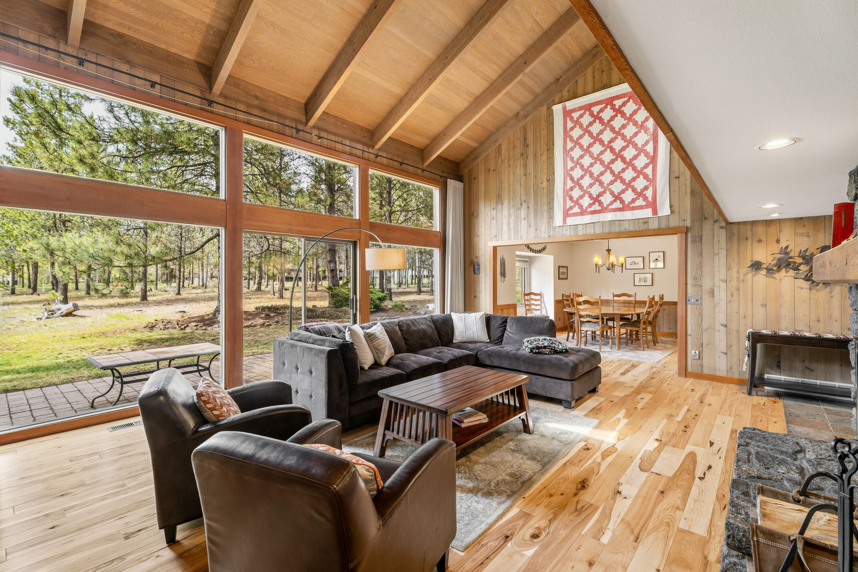 17866 Grouse Lane, Unit 3 Sunriver, OR 97707 - Photo 8 of 61 a living room with furniture tv and large windows