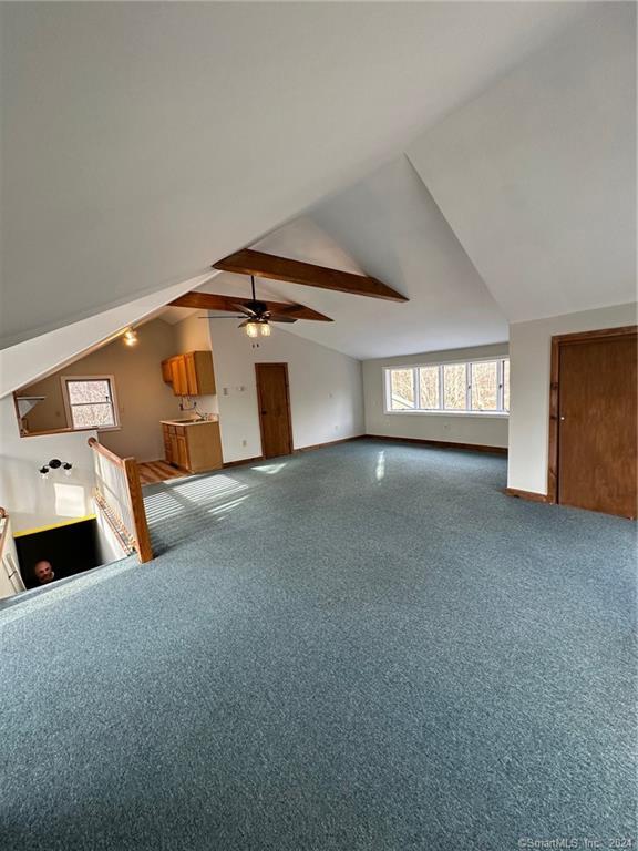 133 A Hazelnut Hill Road, Unit A Groton, CT 06340 - Photo 1 of 1 a front view of a house with a garage