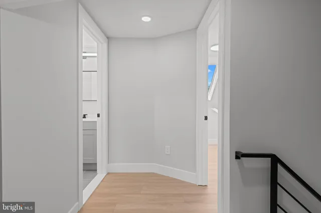 a bathroom with a toilet sink and tub