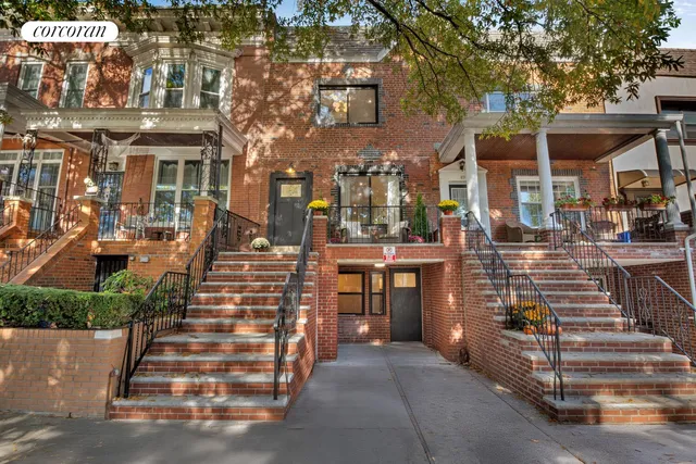 a view of a backyard with sitting area