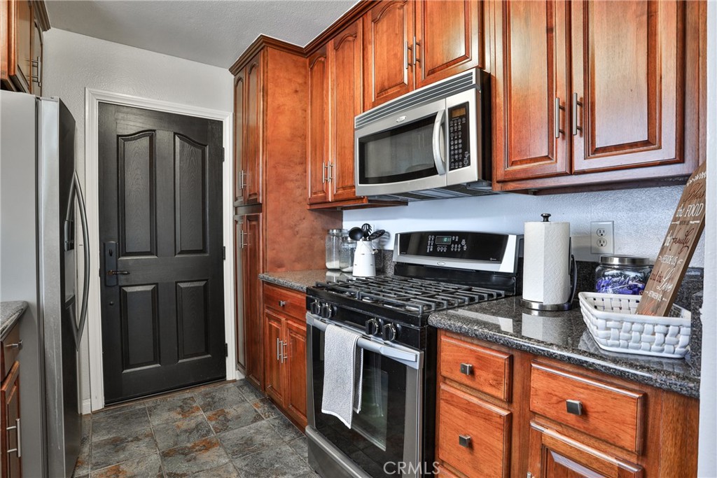 12309 Wintergreen Street Rancho Cucamonga, CA 91739 - Photo 13 of 32 Galley kitchen nicely updated
