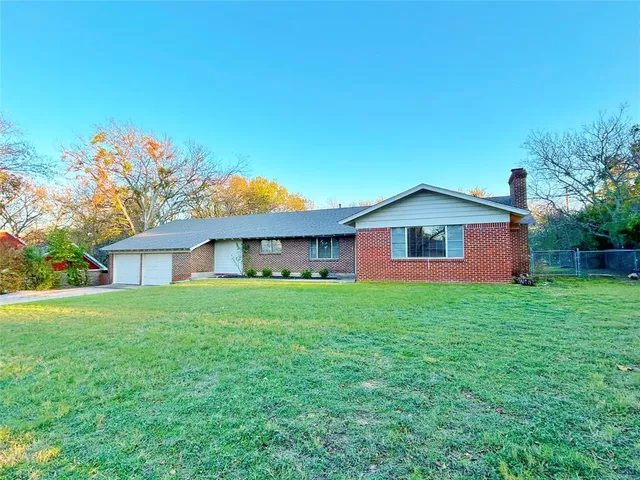 a house view with a garden space