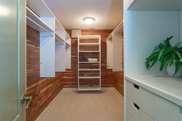 a view of an empty room and a windows