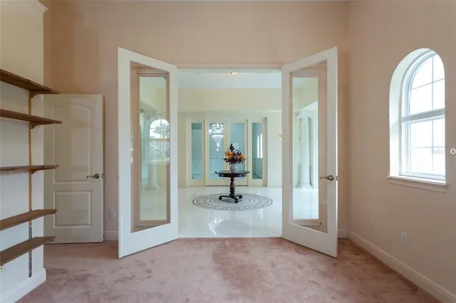 a view of a bathroom with mirror