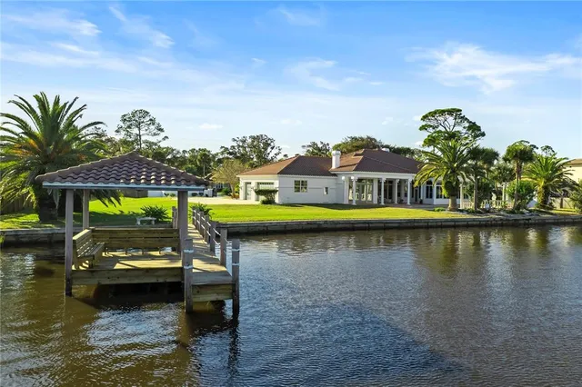 a swimming pool view with a lake view