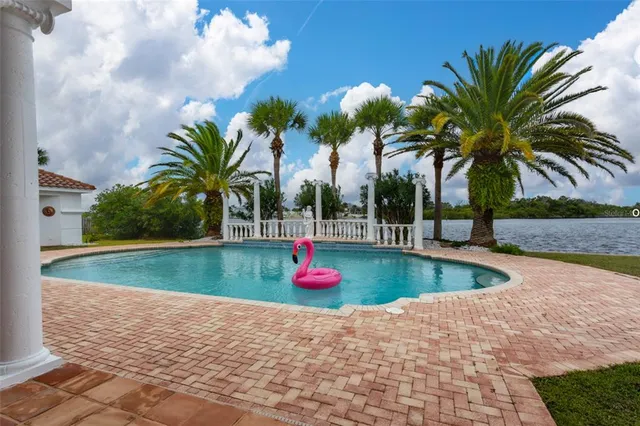 a view of outdoor space with swimming pool