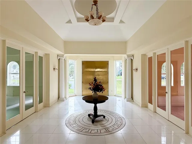 a view of a lobby with a chandelier