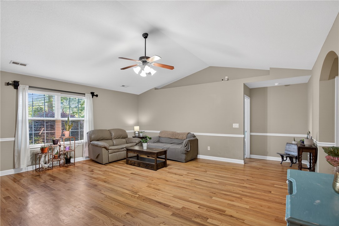 151 Towne Creek Trail Anderson, SC 29621 - Photo 3 of 49 This naturally illuminated living area boasts high vaulted ceilings and beautiful hardwood flooring.
