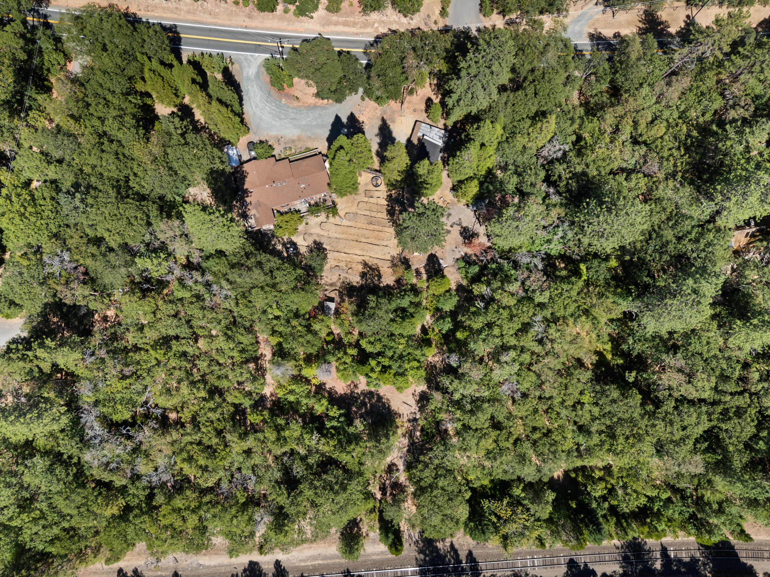 1000 Three Pines Road Grants Pass, OR 97526 - Photo 34 of 37 an aerial view of a residential houses with yard