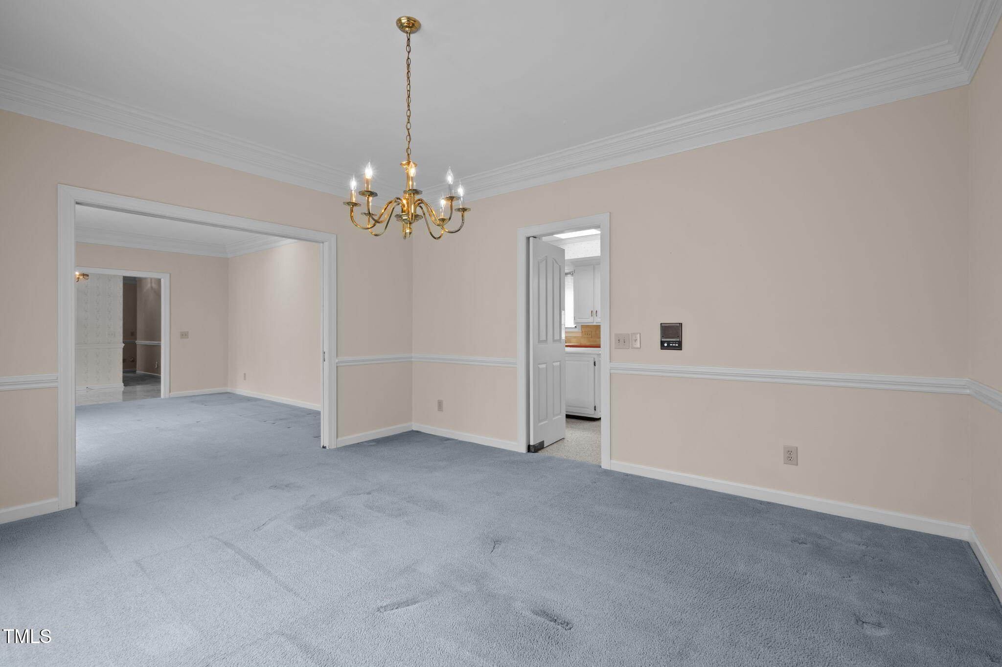 74 Alleghany Drive Roxboro, NC 27573 - Photo 11 of 62 a view of a chandelier in big room and chandelier fan