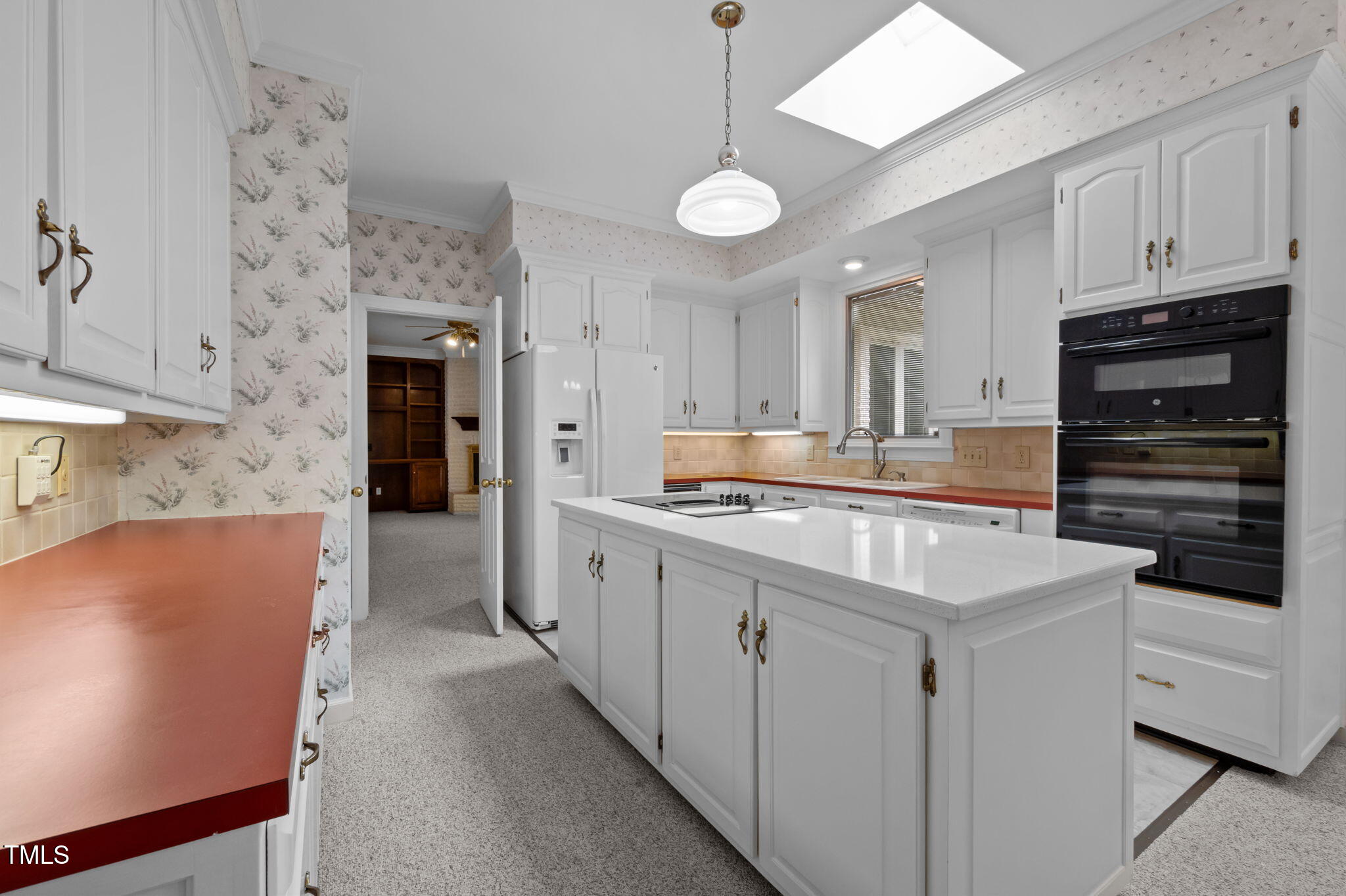 74 Alleghany Drive Roxboro, NC 27573 - Photo 16 of 62 a large kitchen with cabinets
