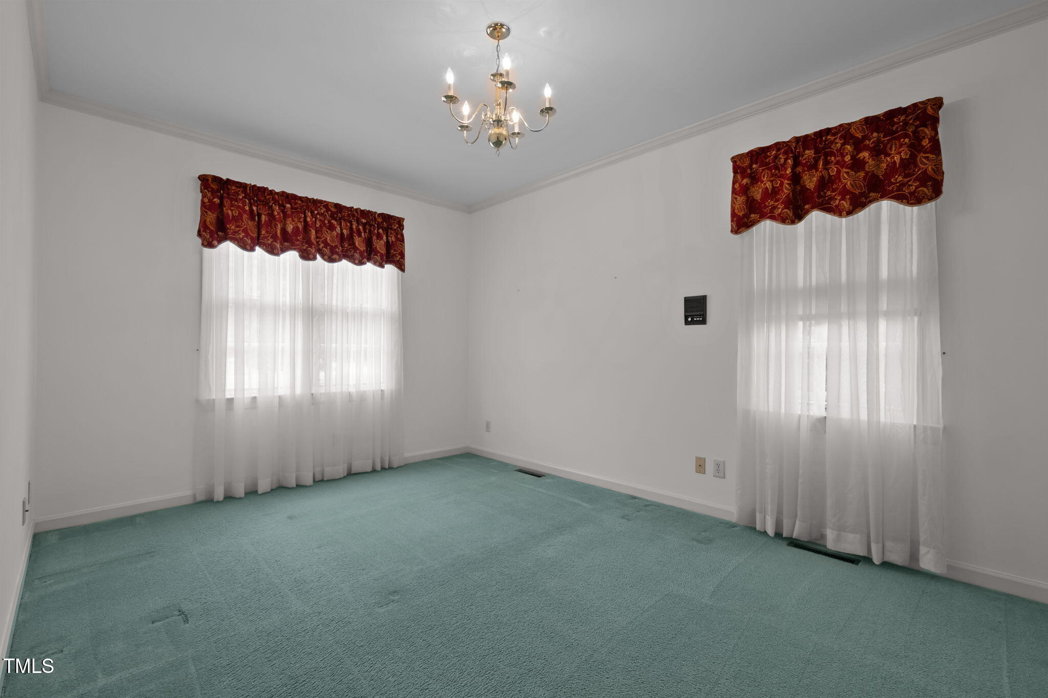 74 Alleghany Drive Roxboro, NC 27573 - Photo 29 of 62 an empty room with windows and closet