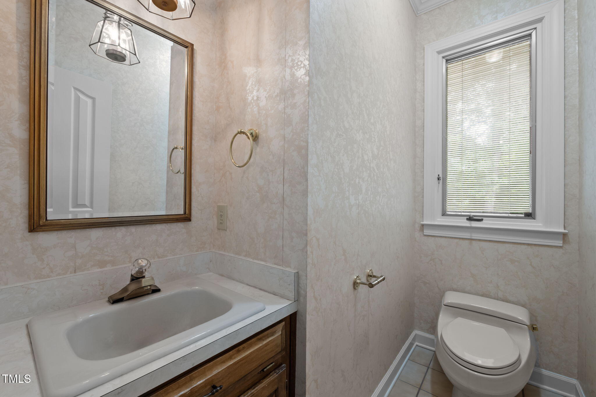 74 Alleghany Drive Roxboro, NC 27573 - Photo 35 of 62 a bathroom with a sink toilet and shower