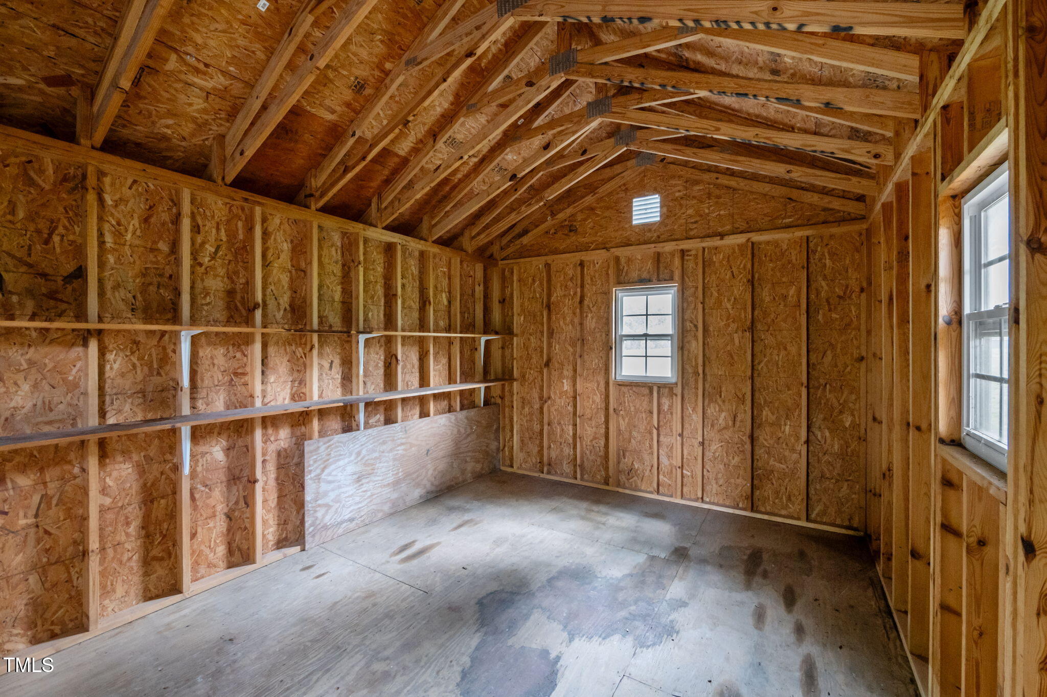 74 Alleghany Drive Roxboro, NC 27573 - Photo 44 of 62 a view of an empty room with a window