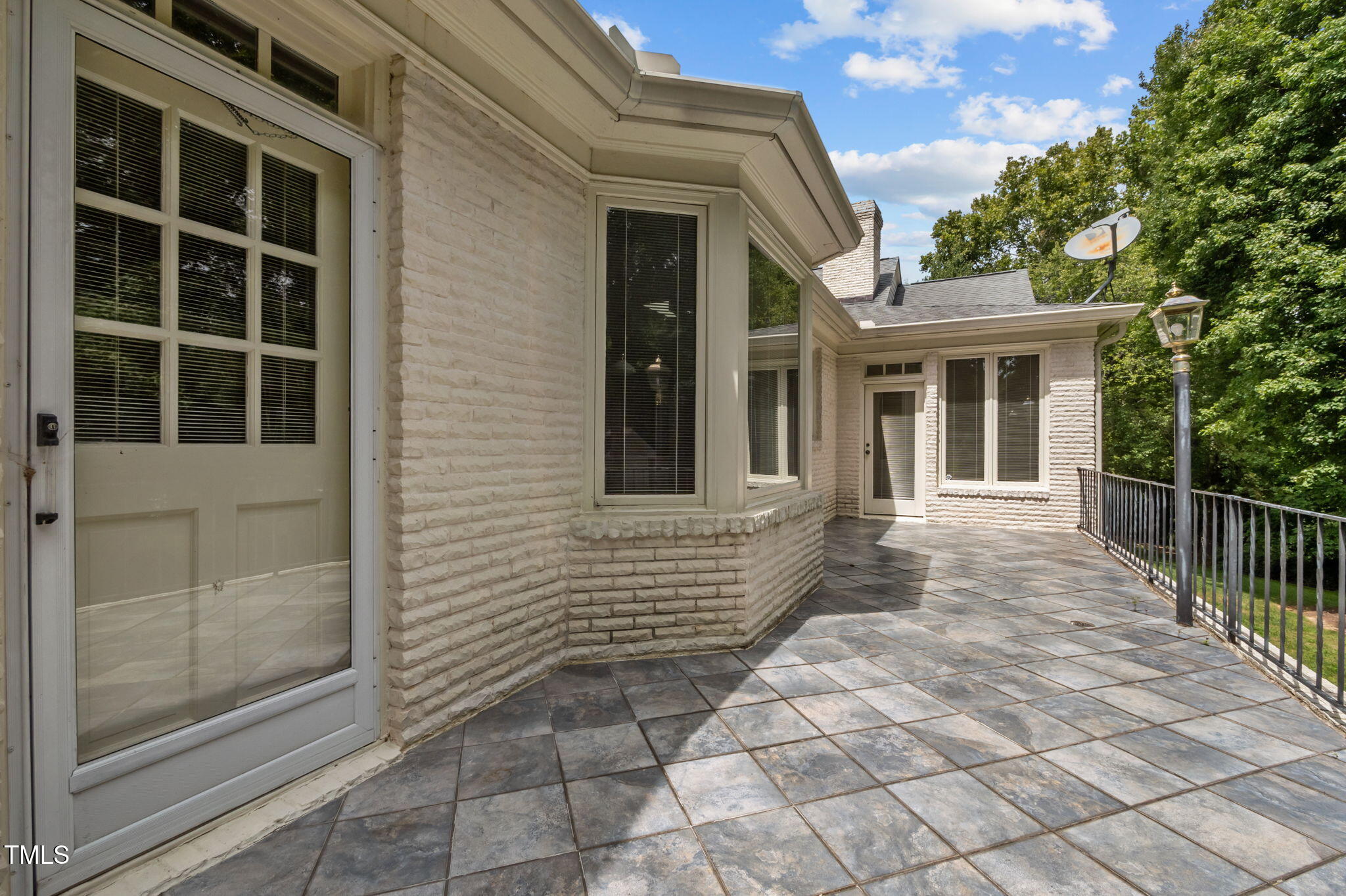 74 Alleghany Drive Roxboro, NC 27573 - Photo 48 of 62 a view of house with backyard and glass windows