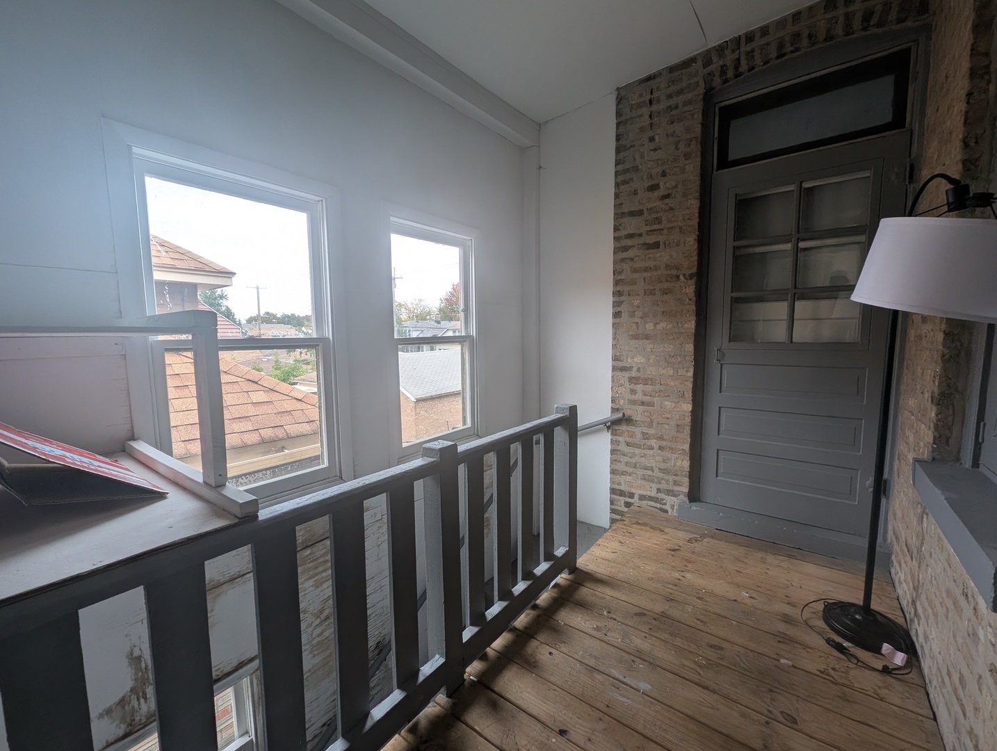 5820 West Berteau Avenue, Unit 2 Chicago, IL 60634 - Photo 12 of 12 a view of hallway with wooden floor and stairs