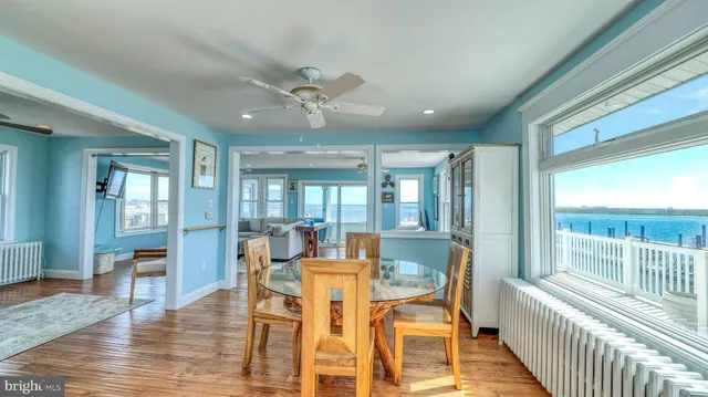 a bed room with a bed next to a window