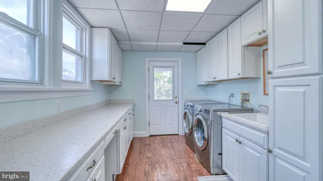 a view of a balcony with chairs