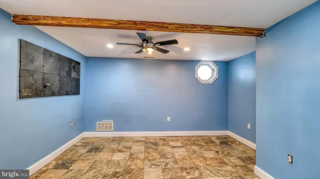 a view of a swimming pool with an outdoor seating