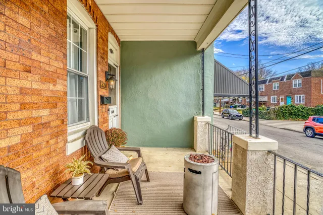 a view of an chairs and table in the balcony