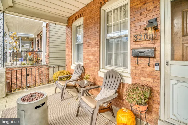 a view of a front door and dining room