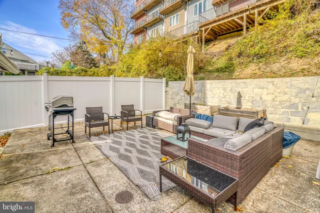 a view of a terrace with furniture