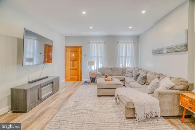 a living room with furniture and a couch