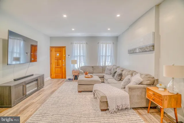 a living room with furniture and a couch