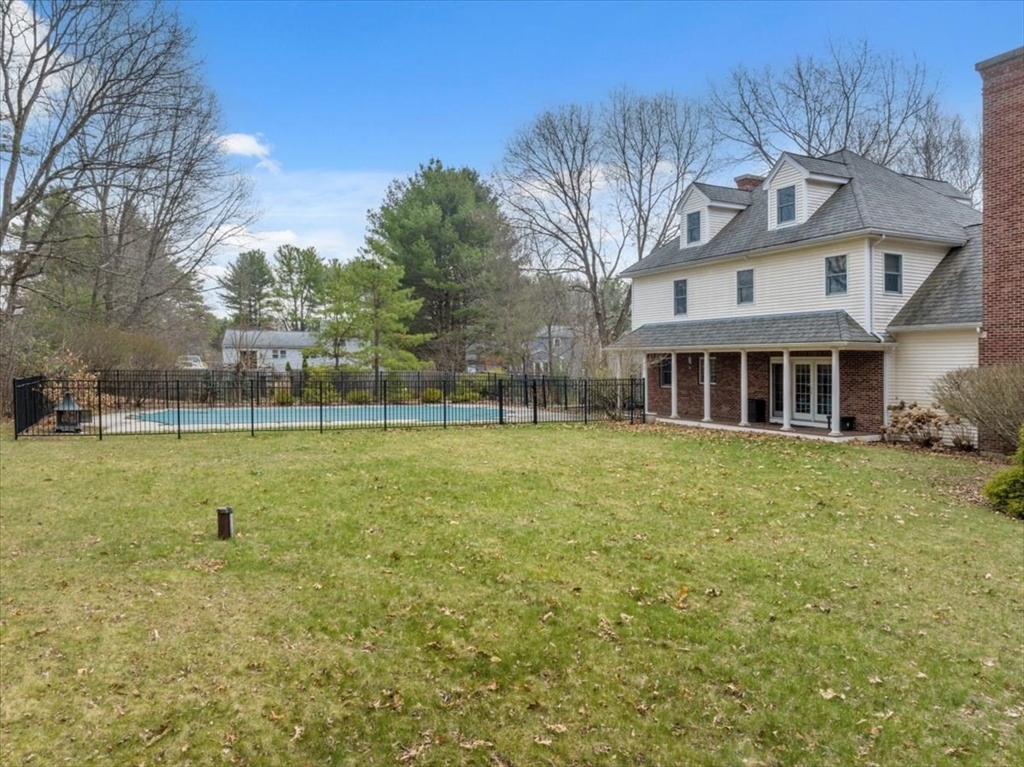 1 Glenbrook Road Framingham, MA 01701 - Photo 15 of 16 a front view of a house with garden