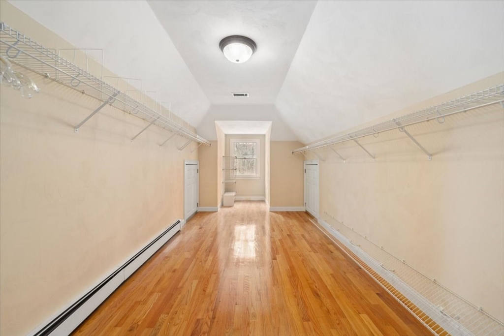 1 Glenbrook Road Framingham, MA 01701 - Photo 10 of 16 a view of an empty room with wooden floor