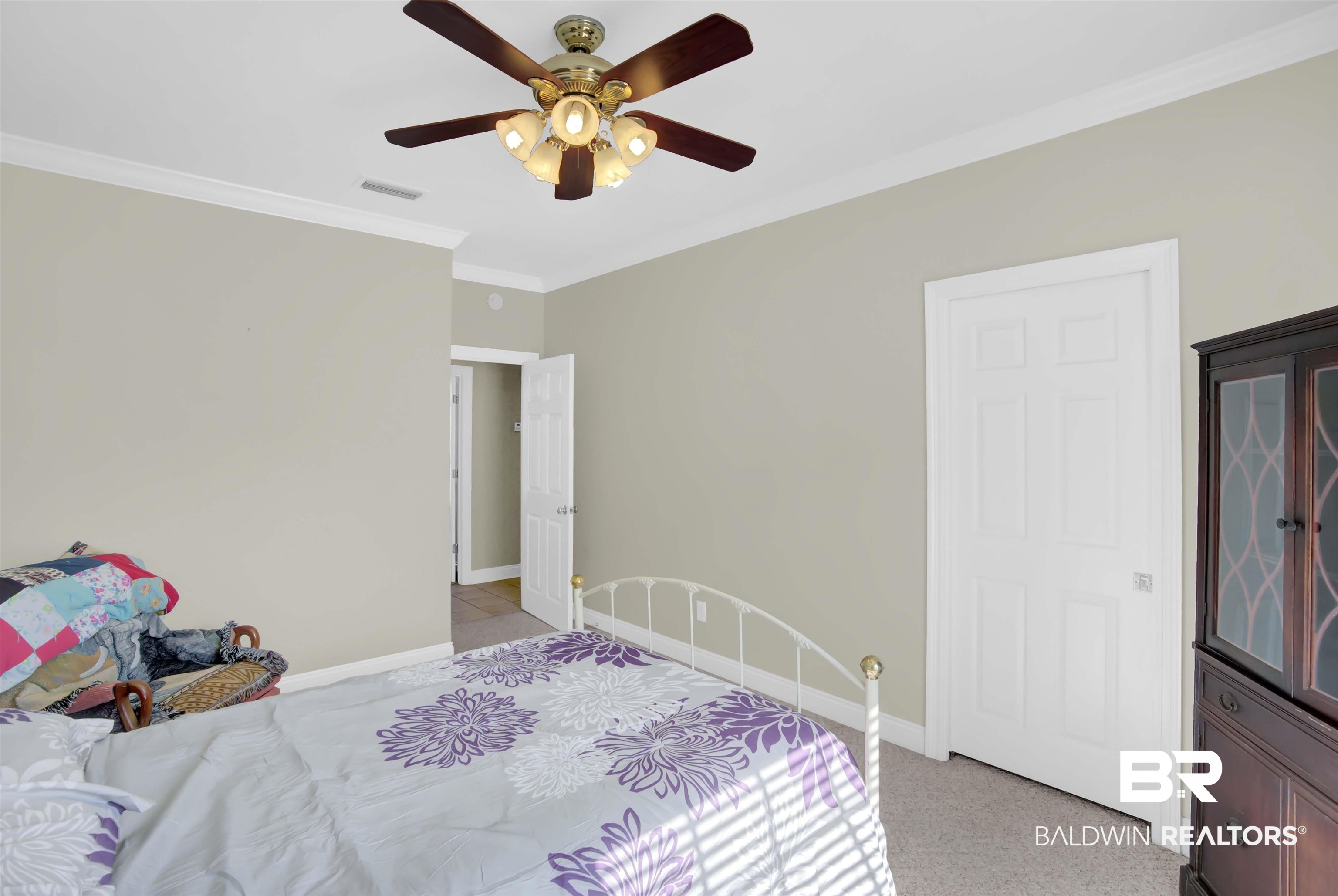 27688 Rigsby Road Daphne, AL 36526 - Photo 35 of 56 Carpeted bedroom with ceiling fan and crown molding