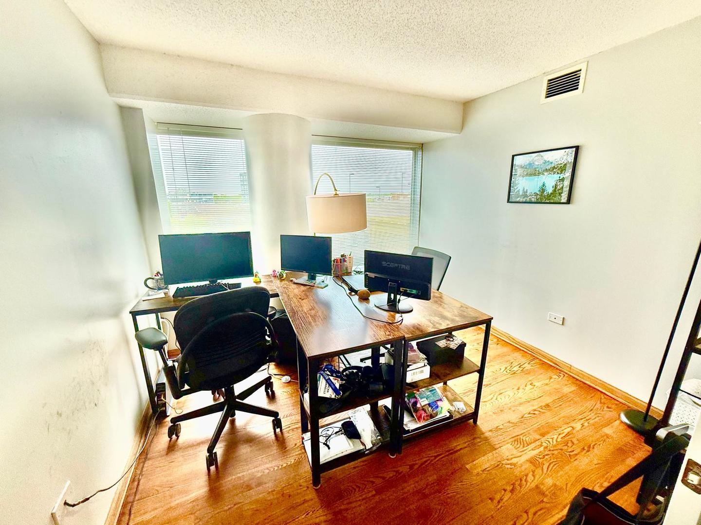 1720 Maple Avenue, Unit 780 Evanston, IL 60201 - Photo 12 of 57 a view of a workspace with furniture and a window