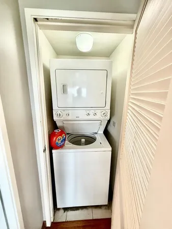 a view of a balcony with wooden floor