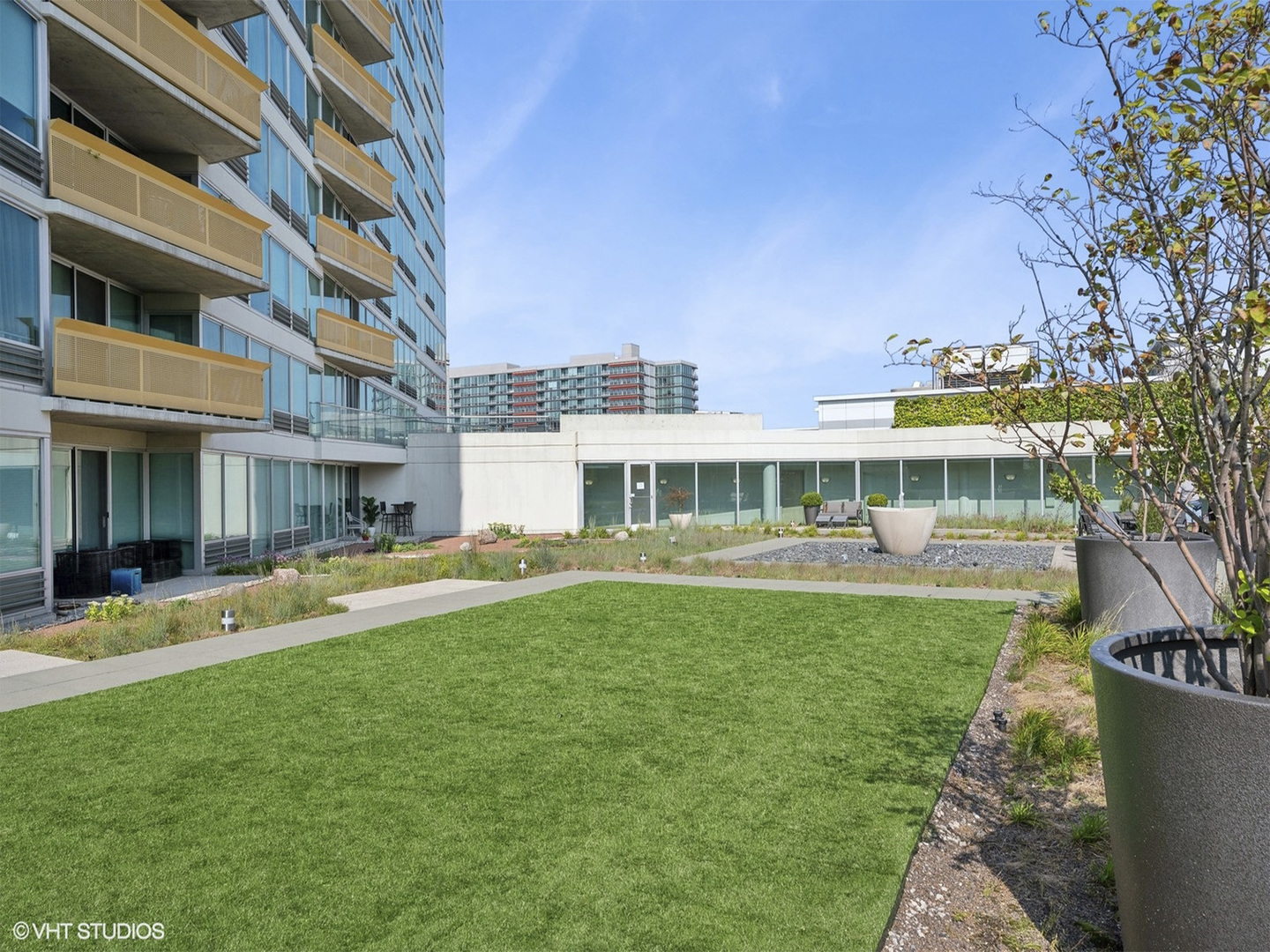 1720 Maple Avenue, Unit 780 Evanston, IL 60201 - Photo 30 of 57 a front view of a house with swimming pool having outdoor seating