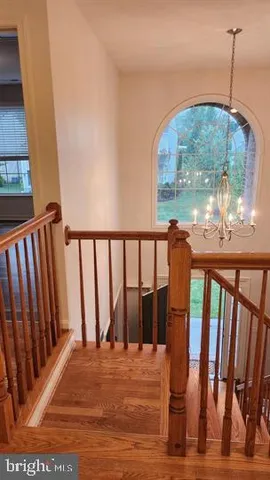 a view of a balcony with wooden floor