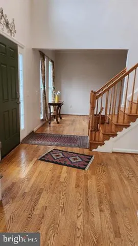 a view of a livingroom with wooden floor