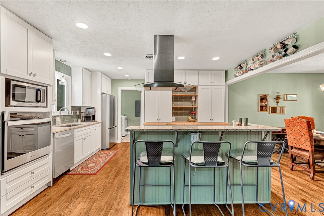 3841 Strawhill Road Richmond, VA 23231 - Photo 12 of 56 Kitchen featuring recessed lighting, wood-finish f