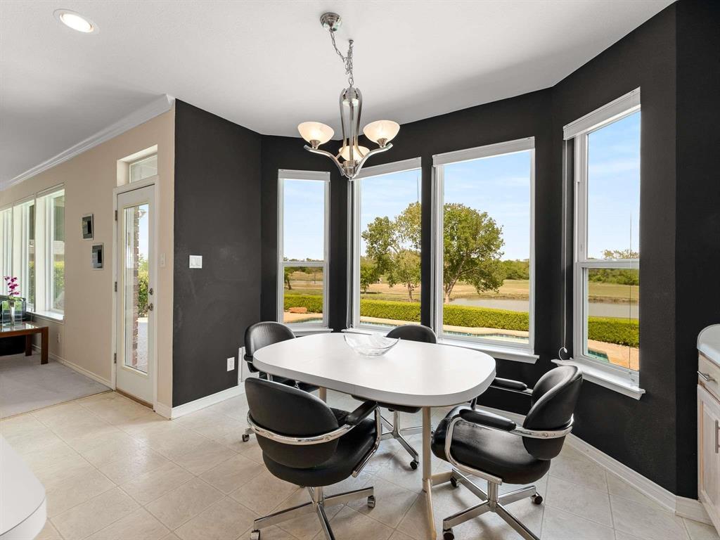7436 Stoney Point Drive Plano, TX 75025 - Photo 29 of 40 a view of a dining room with furniture window and outside view