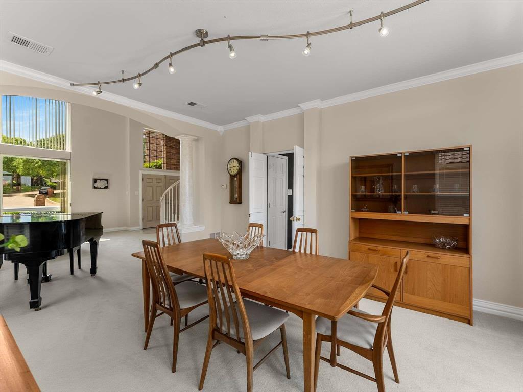 7436 Stoney Point Drive Plano, TX 75025 - Photo 35 of 40 a view of a dining room with furniture and window