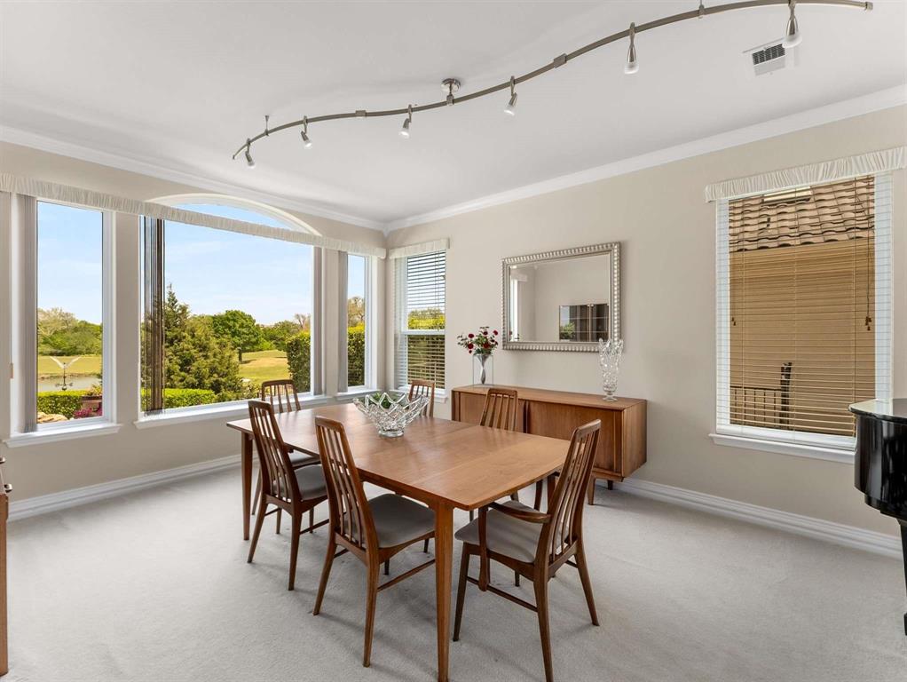 7436 Stoney Point Drive Plano, TX 75025 - Photo 36 of 40 a view of a dining room with furniture window and outside view