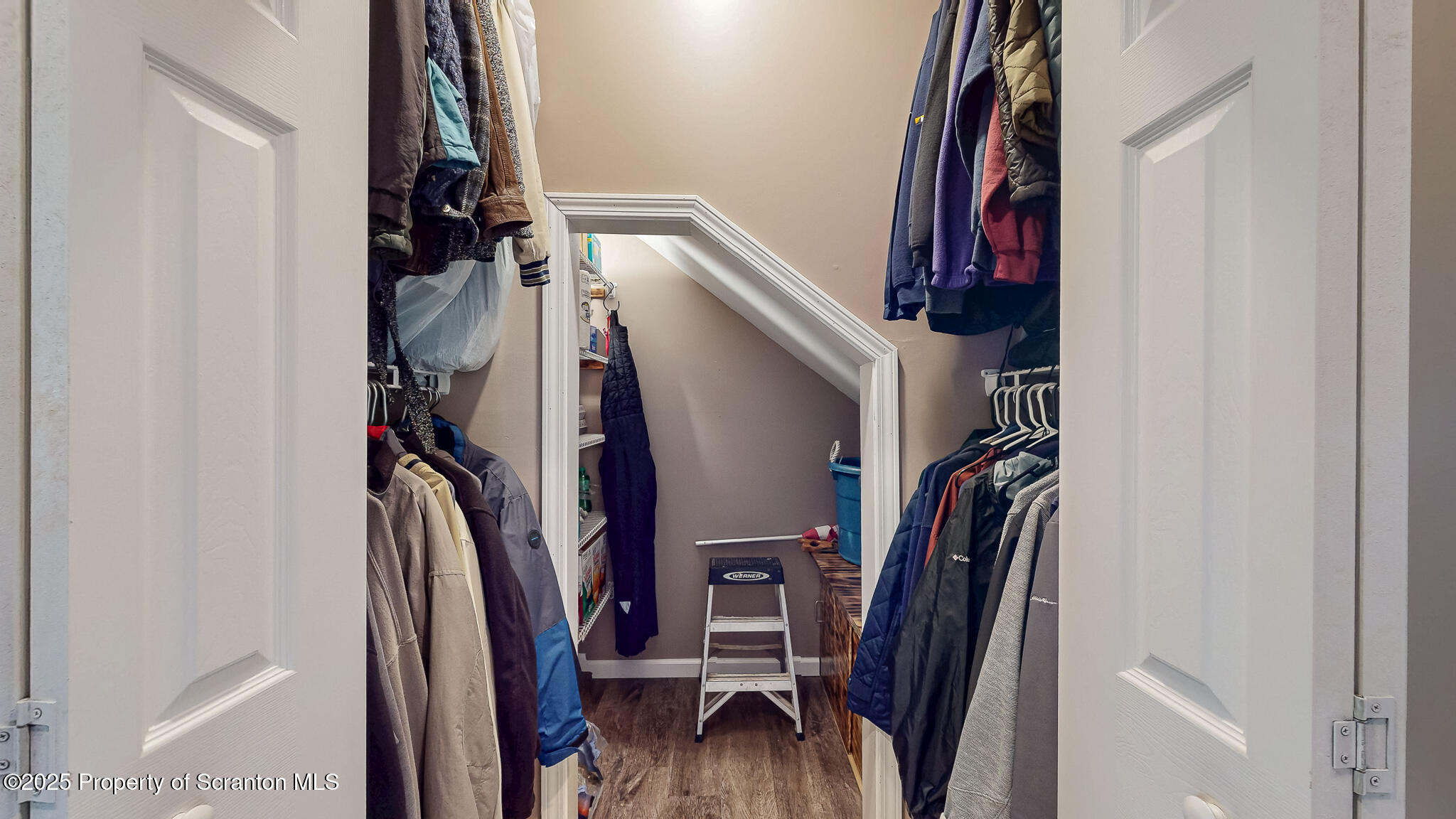233 Shadow Wood Circle Archbald, PA 18403 - Photo 21 of 62 a view of walk in closet with clothes and shoes