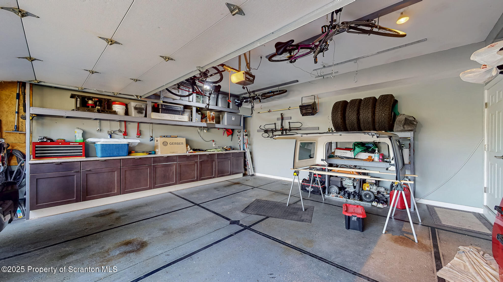 233 Shadow Wood Circle Archbald, PA 18403 - Photo 25 of 62 a kitchen with stainless steel appliances granite countertop lots of wooden cabinets
