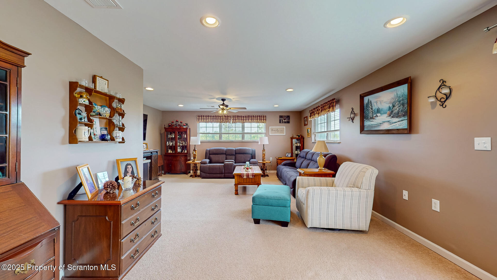 233 Shadow Wood Circle Archbald, PA 18403 - Photo 28 of 62 a living room with furniture and a flat screen tv